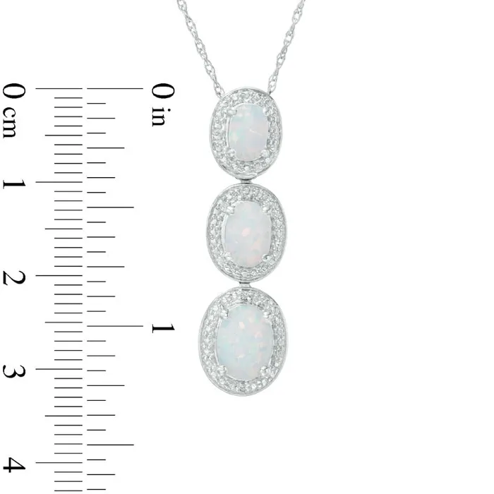 Oval LabCreated Opal and Diamond Accent Frame Three Stone Pendant in Sterling Silver Goldia Necklaces Oval LabCreated Opal and Diamond Accent Frame Three Stone Pendant in Sterling Silver Goldia Necklaces